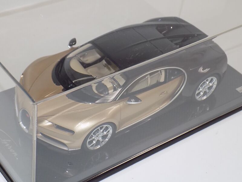 1/18 MR Collection Bugatti Chiron in Gold and Brown Carbon Fiber on Carbon Base $929.95 ModelCarsHub