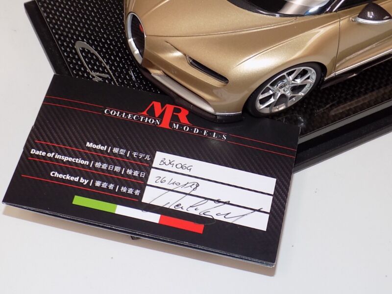 1/18 MR Collection Bugatti Chiron in Gold and Brown Carbon Fiber on Carbon Base $929.95 ModelCarsHub