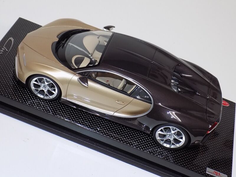 1/18 MR Collection Bugatti Chiron in Gold and Brown Carbon Fiber on Carbon Base $929.95 ModelCarsHub