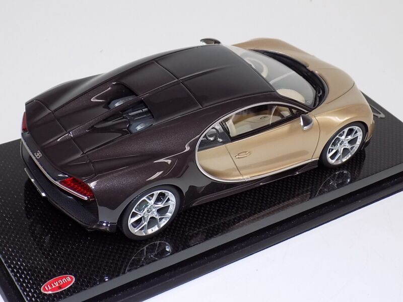 1/18 MR Collection Bugatti Chiron in Gold and Brown Carbon Fiber on Carbon Base $929.95 ModelCarsHub