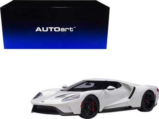 1/18 Autoart 2017 Ford GT Frozen White Real rubber tires. Steerable wheels. Has carpeted interior. Functioning rear spoiler. This item is made of composite. Opening hood, doors and engine compartment. Detailed exterior, interior, engine compartment. Dimen