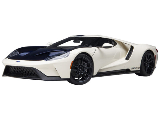 1/18 AUTOart FORD GT HERITAGE EDITION PROTOTYPE WIMBLEDON WHITE 72926 Model car by Autoart. Real rubber tires. True-to-scale detail. Has steerable wheels. Carpeted interior and trunk. Opening doors and engine compartment. Dimensions approximately L-10, W-