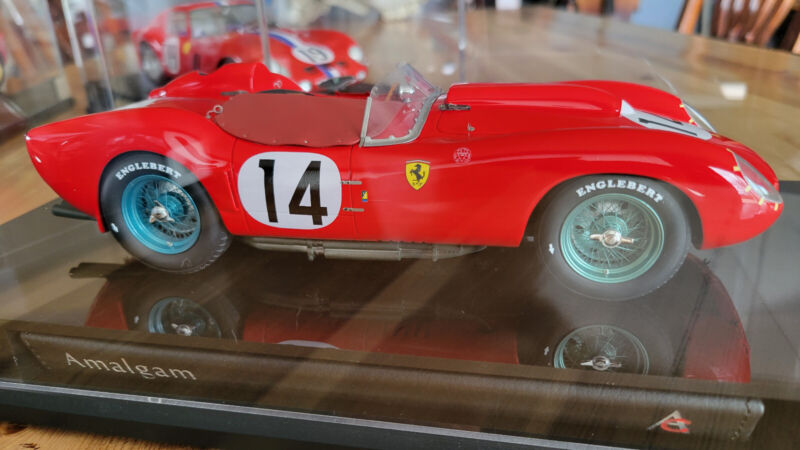 1/18 Amalgam Ferrari 250 TR 1958 Le Mans Winner The outer sleeve has some shelf wear/very minor creasing. Please contact me if you would like pictures of this. This is a very heavy model (10.5 pounds!) due to its heavy mounting base, booklet, and special